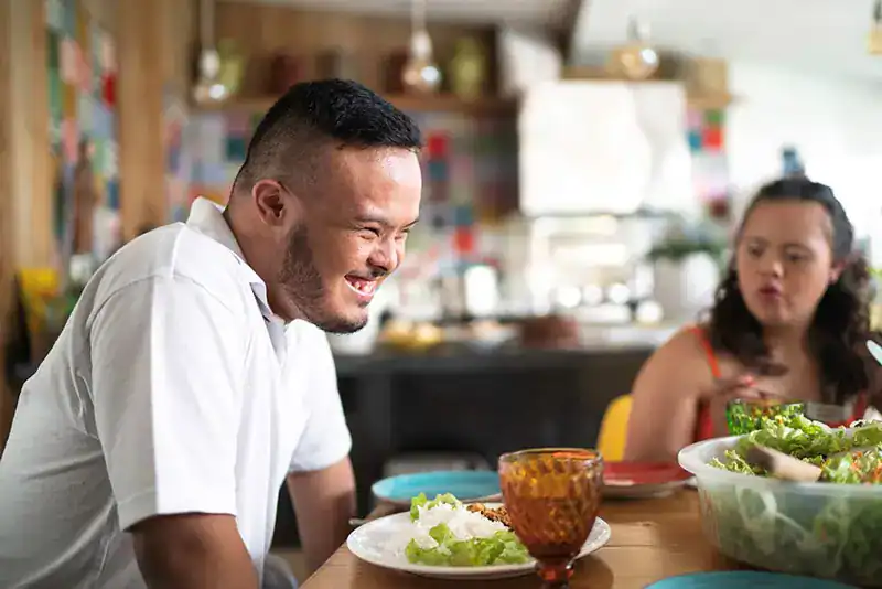 Empowering Weight Loss: A Comprehensive Guide for Individuals with Disabilities 2 Image of a disabled man and balance around nutrition to aid weight loss Buxton