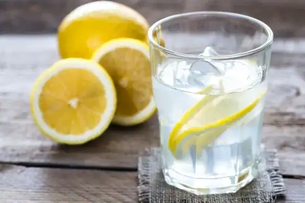 Hydration: The Secret Ingredient for a Toned Stomach and Enhanced Fitness 2 Image of lemon water to aid hydration Buxton