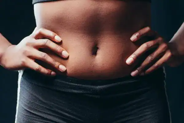 Toning Your Stomach: The Ultimate Guide to Achieving a Sculpted Stomach While Shedding Pounds 1 Image of a toned stomach after non surgical treatment Buxton